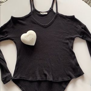 Open shoulder long sleeve top.